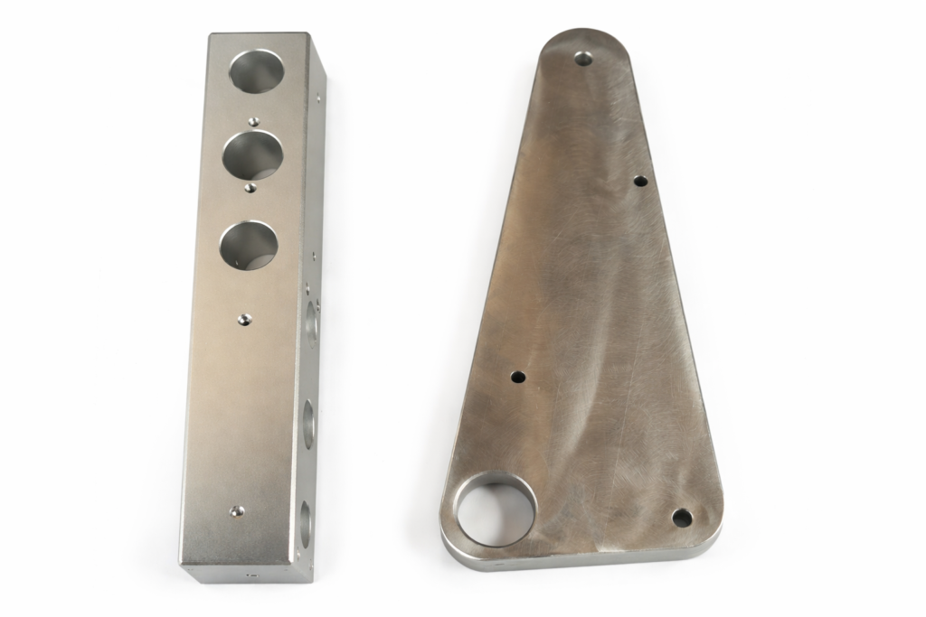 precision machined aluminum components on display